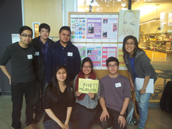 Photo: Face of HIV: POSI+IVE ART: SFU students of Group 19 with their finsihed Project: Face of HIV Bradford McIntyre, Positively Positive. Group Members: Carmen Leung, Keith Tse, Ka-Wing Ng, Joshua Loo, Roy Ortega. Leandro Dela Cruz, and Sarrah Vinluan - August 4, 2013.